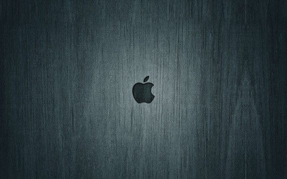 Apple logo on wooden motive